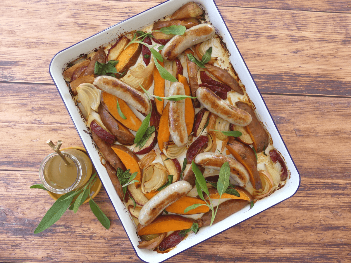 Kumara, Apple and Sage Tray Bake with Pork Sausages Hellers